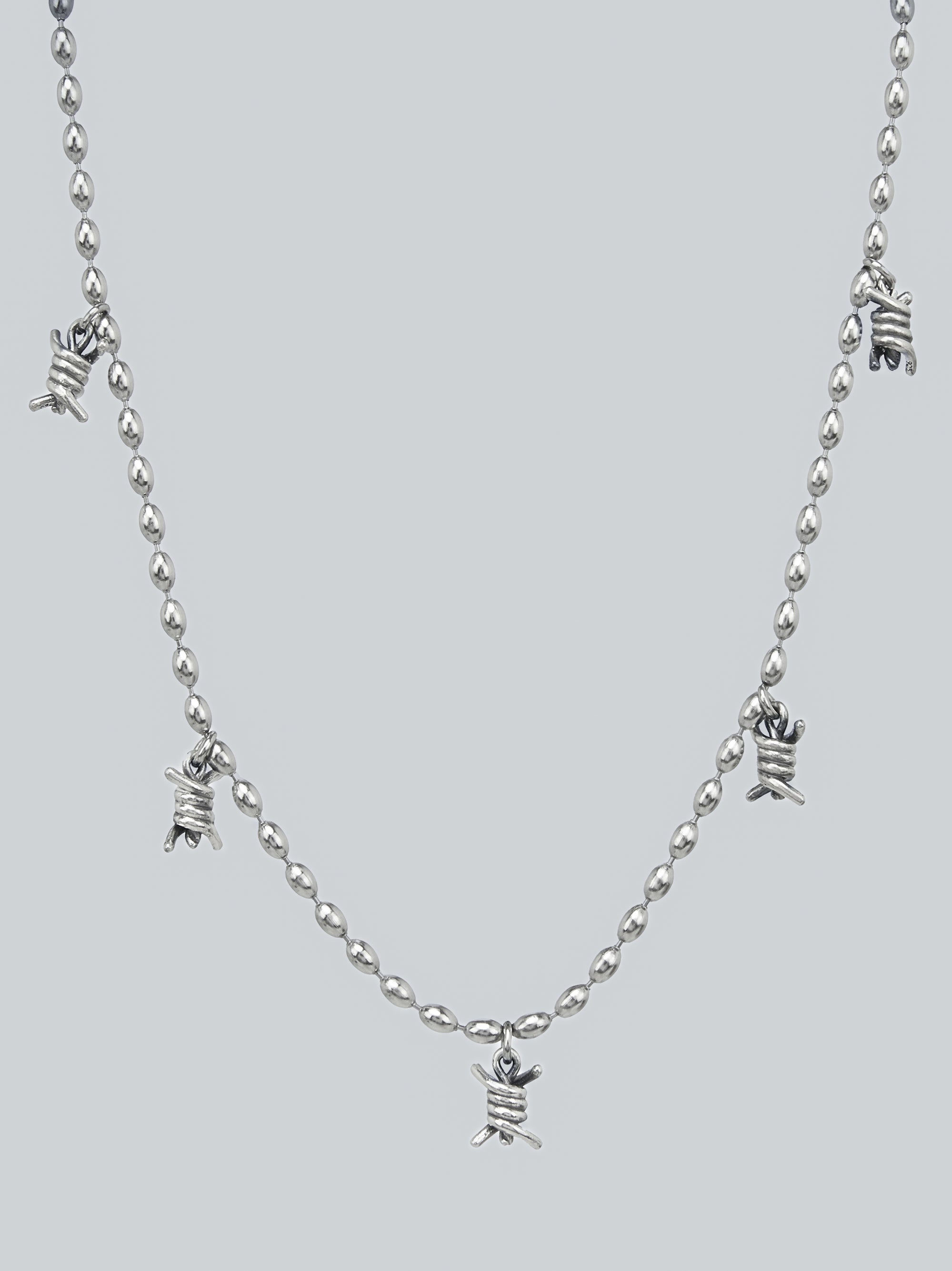 MULTI TWIDDLE CHARM NECKLACE